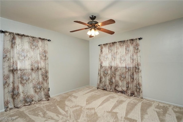 1658 Bronson Rd, Akron, OH 44305 - carpeted empty room with a ceiling fan and baseboards