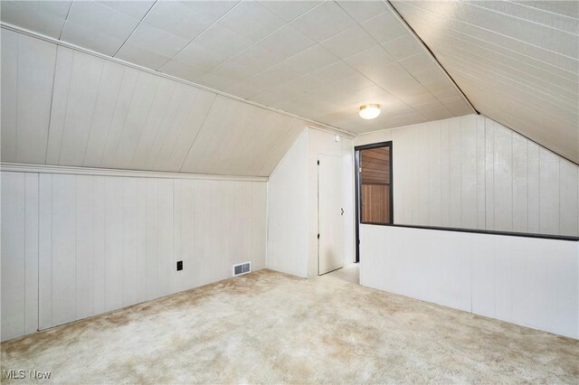 1658 Bronson Rd, Akron, OH 44305 - bonus room featuring carpet, wooden walls, and vaulted ceiling