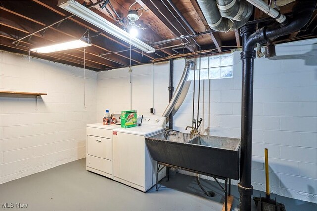 1658 Bronson Rd, Akron, OH 44305 - basement featuring washing machine and dryer and a sink