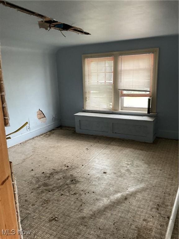17205 Mapleboro Ave, Maple Heights, OH 44137 - empty room with baseboards