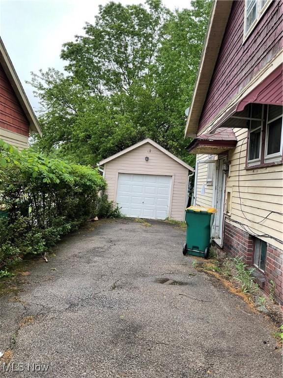 17205 Mapleboro Ave, Maple Heights, OH 44137 - detached garage featuring driveway