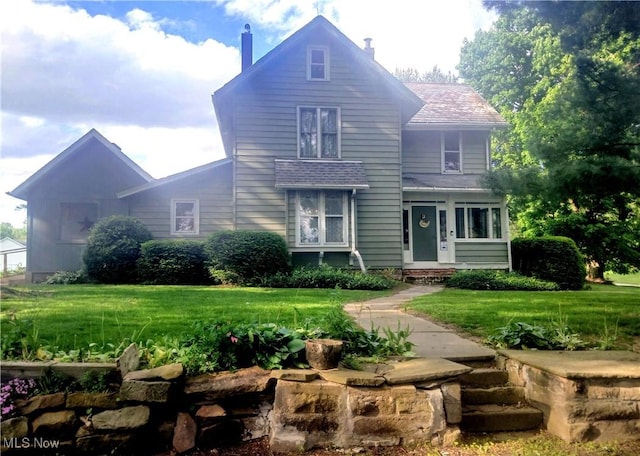 2775 Sr 9, Salem, OH 44460 - traditional home featuring a chimney and a front lawn