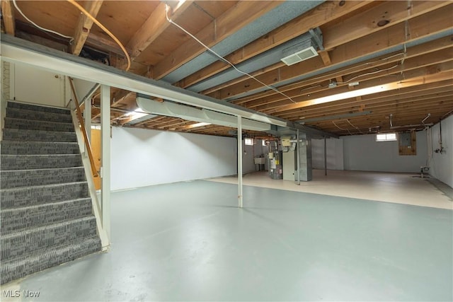 338 Applegrove St NE, North Canton, OH 44720 - basement featuring stairway, water heater, and heating unit