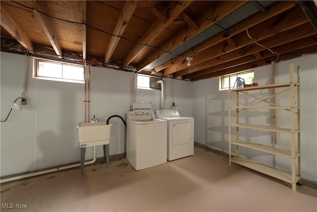 338 Applegrove St NE, North Canton, OH 44720 - below grade area featuring washer and dryer and a sink