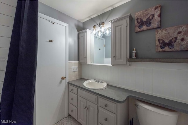 338 Applegrove St NE, North Canton, OH 44720 - bathroom with vanity and tile patterned floors