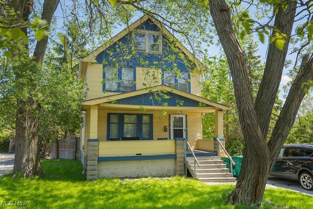 17421 Broadway Ave, Maple Heights, OH 44137 - view of front of house featuring a porch
