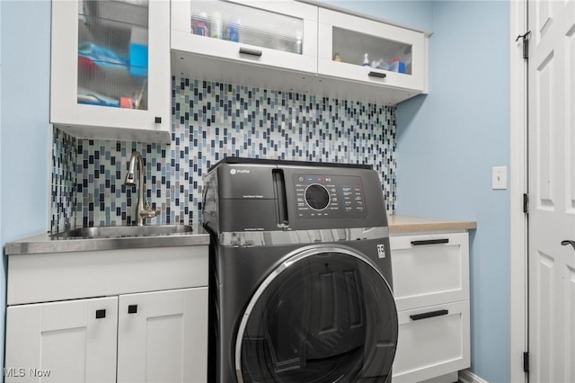 2668 Canvasback Cir, Akron, OH 44319 - laundry room with washer / clothes dryer and cabinet space
