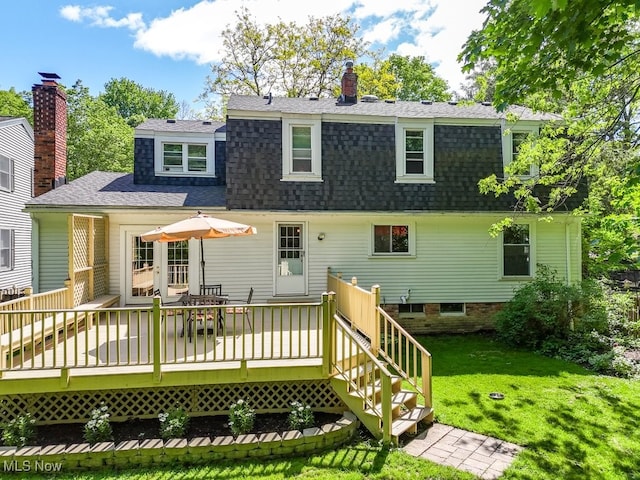 139 Elm Ct, Chagrin Falls, OH 44022 - rear view of property with roof with shingles, a lawn, a deck, and a chimney