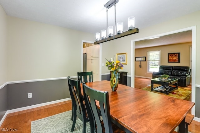 139 Elm Ct, Chagrin Falls, OH 44022 - dining room featuring wood finished floors and baseboards
