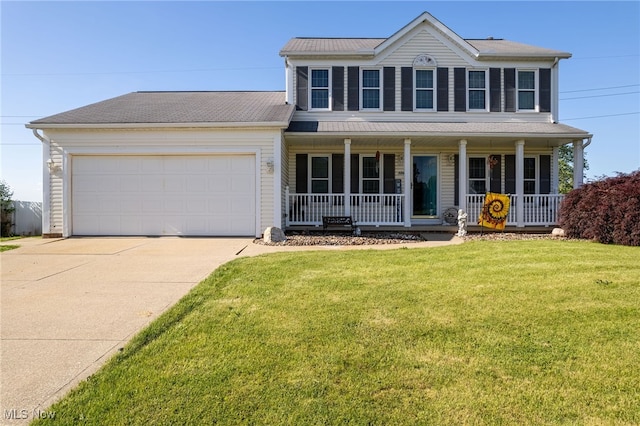104 Joshua Dr, Rittman, OH 44270 - view of front of house featuring covered porch, driveway, a garage, and a front yard