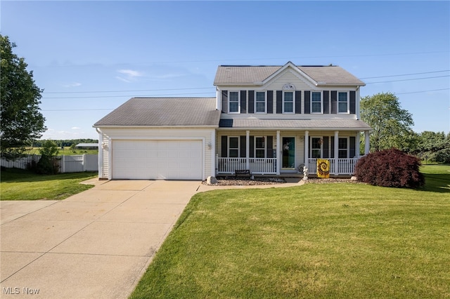 104 Joshua Dr, Rittman, OH 44270 - view of front facade with a garage, driveway, and covered porch