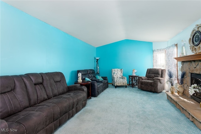 104 Joshua Dr, Rittman, OH 44270 - carpeted living area featuring a stone fireplace and vaulted ceiling