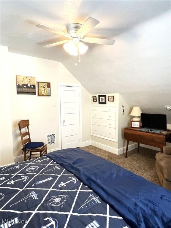 2024 W 10th St, Ashtabula, OH 44004 - bedroom featuring vaulted ceiling, carpet flooring, baseboards, and ceiling fan