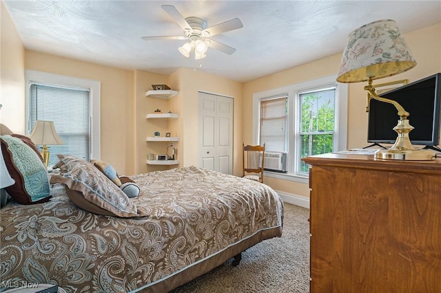 2024 W 10th St, Ashtabula, OH 44004 - bedroom with carpet, a closet, cooling unit, baseboards, and ceiling fan