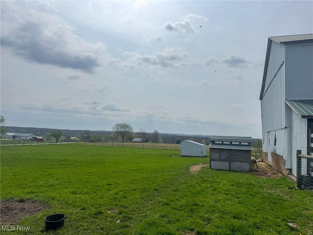 16321 Burton Windsor Rd, Middlefield, OH 44062 - view of green lawn with an outdoor structure, central AC, and a view of rural / pastoral area