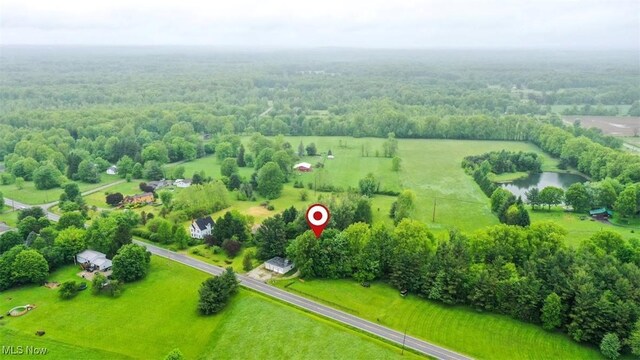 10597 State Route 82, Windham, OH 44288 - aerial view of sparsely populated area featuring a nearby body of water and a heavily wooded area
