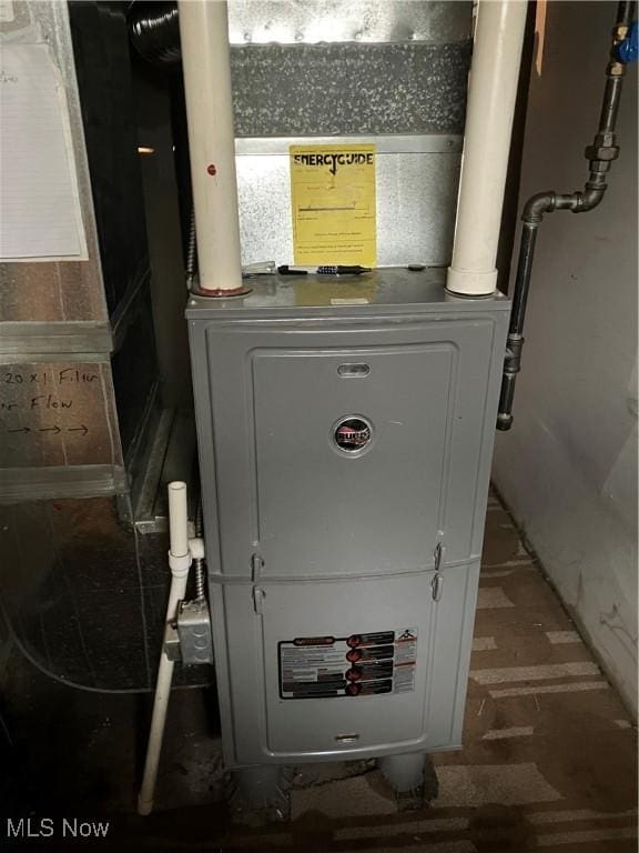 1293 W Jackson St, Painesville, OH 44077 - utility room with heating unit