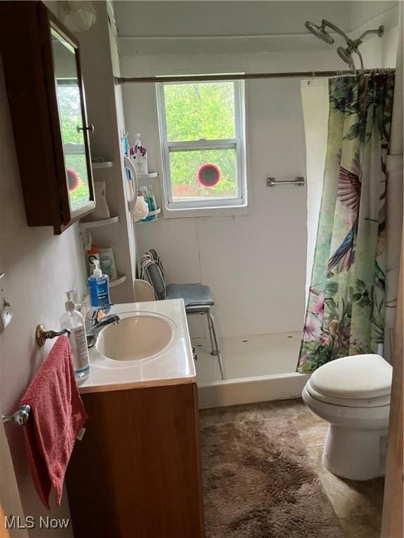 1293 W Jackson St, Painesville, OH 44077 - bathroom with toilet, vanity, and a shower stall