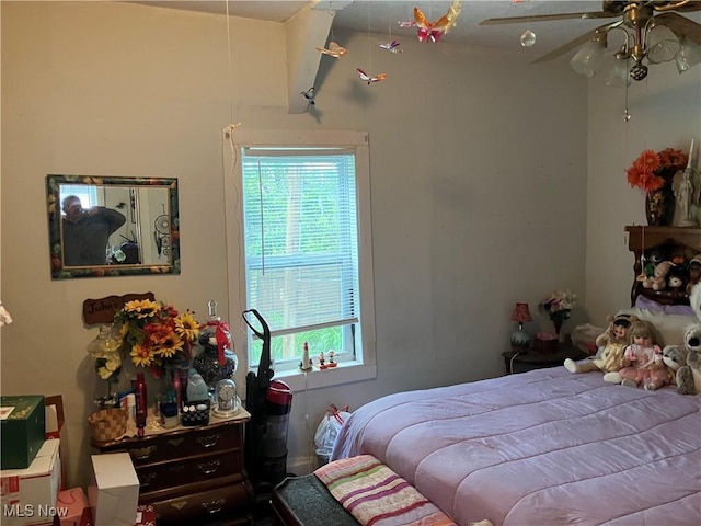 1293 W Jackson St, Painesville, OH 44077 - bedroom with multiple windows and a ceiling fan