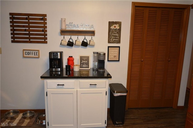 238 E Main St, New London, OH 44851 - bar with dark wood finished floors