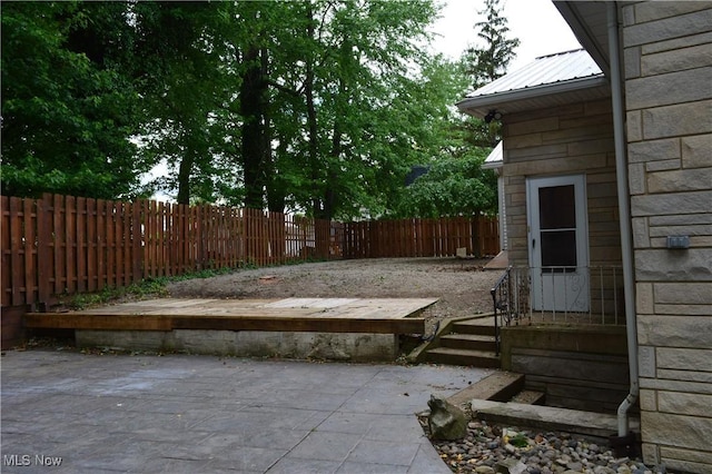 238 E Main St, New London, OH 44851 - fenced backyard with a patio