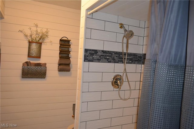 238 E Main St, New London, OH 44851 - full bath with a tile shower and wooden walls