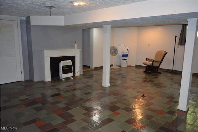 238 E Main St, New London, OH 44851 - finished below grade area with heating unit and a textured ceiling