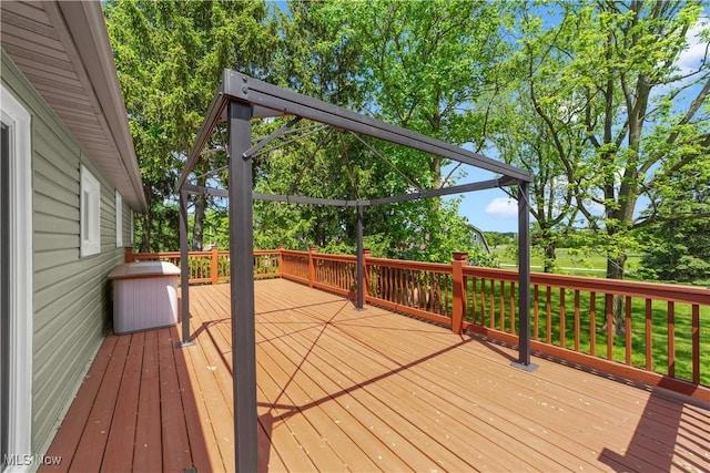 9113 Dean Rd, Vermilion, OH 44089 - wooden deck with view of wooded area