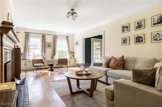 2671 Haddam Rd, Cleveland, OH 44120 - living room with ornamental molding, hardwood / wood-style floors, and a fireplace