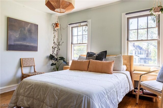 2671 Haddam Rd, Cleveland, OH 44120 - bedroom featuring ornamental molding, hardwood / wood-style flooring, and baseboards