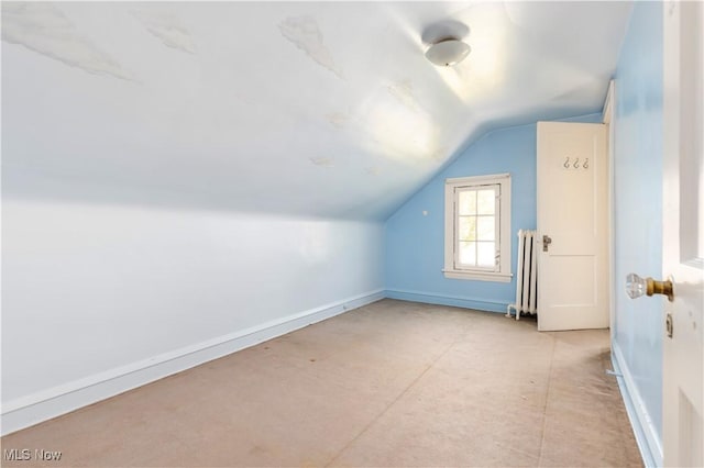 2671 Haddam Rd, Cleveland, OH 44120 - additional living space featuring radiator, lofted ceiling, and baseboards