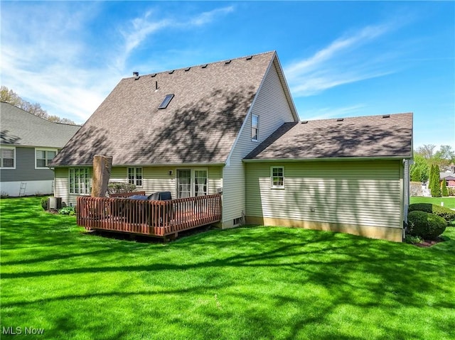 961 Prescot Ave NW, Massillon, OH 44646 - rear view of house featuring a shingled roof, a deck, and a lawn