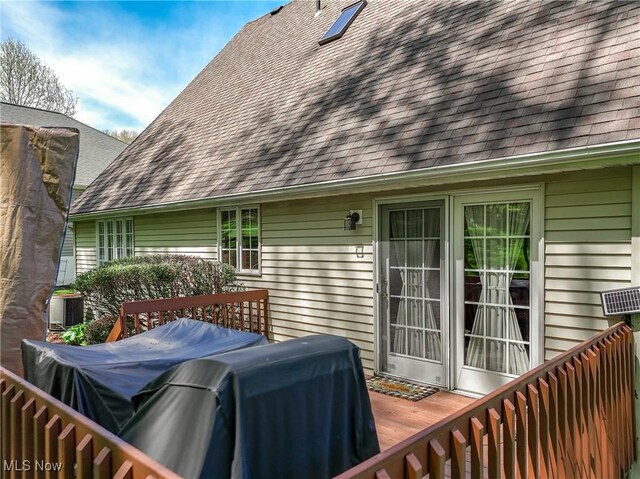 961 Prescot Ave NW, Massillon, OH 44646 - wooden deck featuring central AC unit