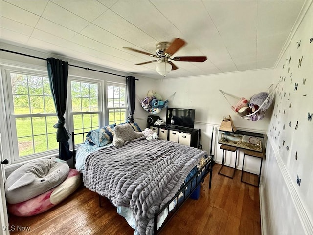 7509 S Palmyra Rd, Canfield, OH 44406 - bedroom with ornamental molding, hardwood / wood-style floors, and a ceiling fan