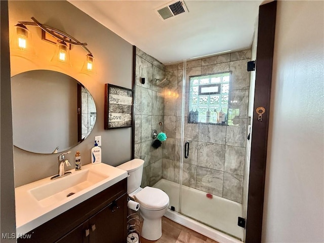 7509 S Palmyra Rd, Canfield, OH 44406 - full bathroom with a stall shower, toilet, and vanity