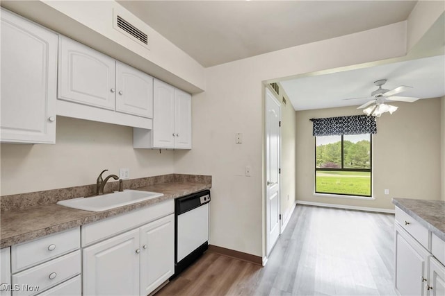 1145 Canyon View Rd Unit 206, Sagamore Hills, OH 44067 - kitchen featuring white dishwasher, a sink, light wood finished floors, a ceiling fan, and white cabinets