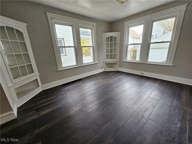 3891 W 21st St, Cleveland, OH 44109 - spare room with dark wood finished floors and baseboards