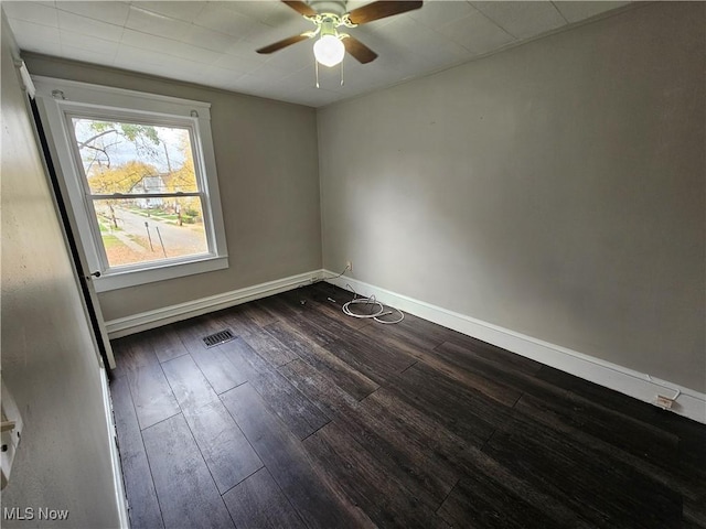3891 W 21st St, Cleveland, OH 44109 - unfurnished room featuring a ceiling fan, dark wood-style flooring, and baseboards