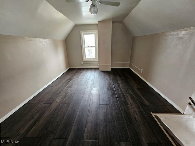 3891 W 21st St, Cleveland, OH 44109 - bonus room with a ceiling fan, dark wood-style flooring, lofted ceiling, and baseboards