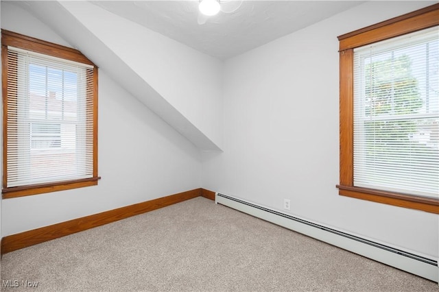 1138 W 6th St, Lorain, OH 44052 - bonus room with a baseboard radiator, carpet flooring, baseboards, and vaulted ceiling