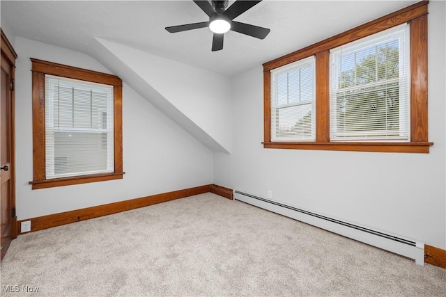 1138 W 6th St, Lorain, OH 44052 - additional living space featuring baseboard heating, carpet floors, baseboards, and a ceiling fan