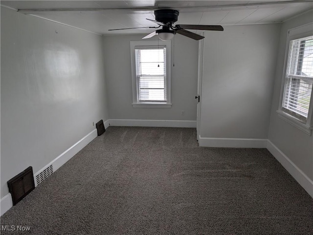 630 N Lincoln Ct, Louisville, OH 44641 - empty room with carpet and a ceiling fan