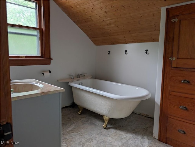 630 N Lincoln Ct, Louisville, OH 44641 - full bath with a freestanding tub, lofted ceiling, vanity, and wood ceiling