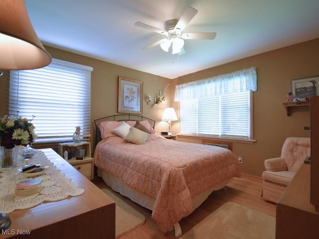 4628 Monticello Blvd, South Euclid, OH 44143 - bedroom with wood finished floors, ceiling fan, and baseboards