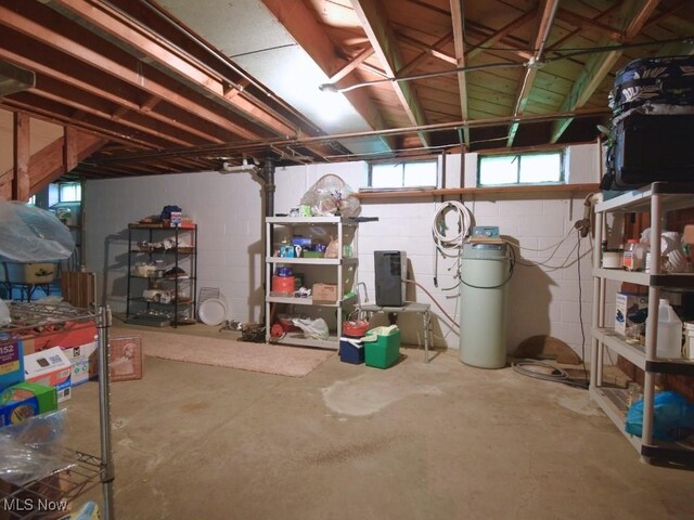 4628 Monticello Blvd, South Euclid, OH 44143 - basement with a water softener, plenty of natural light, and concrete block wall