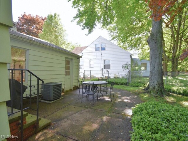 4628 Monticello Blvd, South Euclid, OH 44143 - view of patio with central air condition unit and outdoor dining space