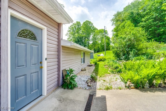 10311 Myers Rd, Kensington, OH 44427 - doorway to property with view of scattered trees