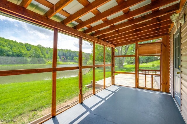 10311 Myers Rd, Kensington, OH 44427 - unfurnished sunroom featuring a water view