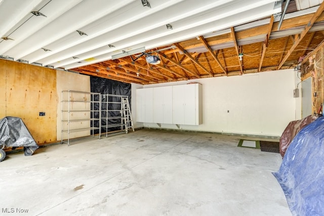 10311 Myers Rd, Kensington, OH 44427 - garage featuring a garage door opener