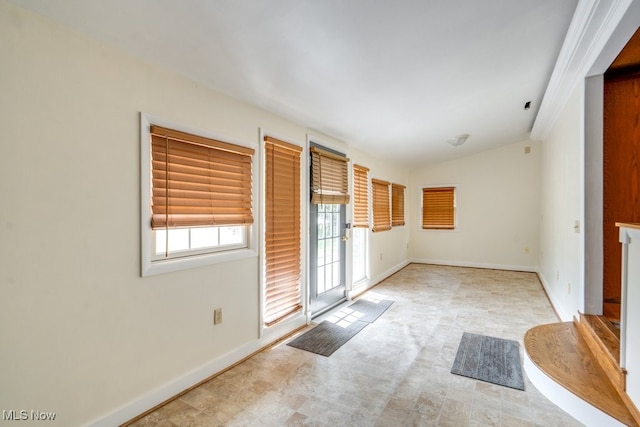 10311 Myers Rd, Kensington, OH 44427 - empty room featuring lofted ceiling and baseboards
